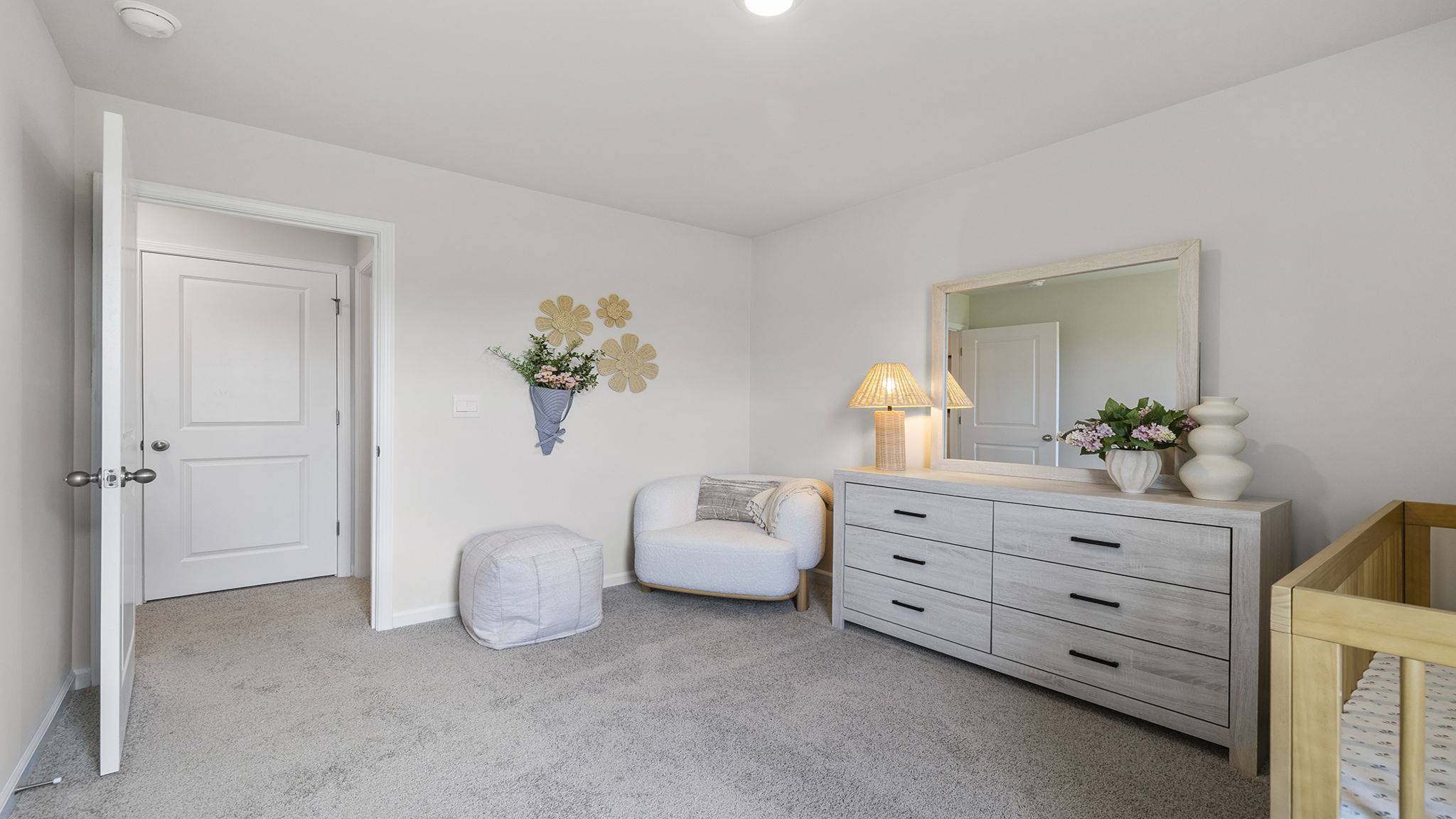 Bedroom with carpet and windows.