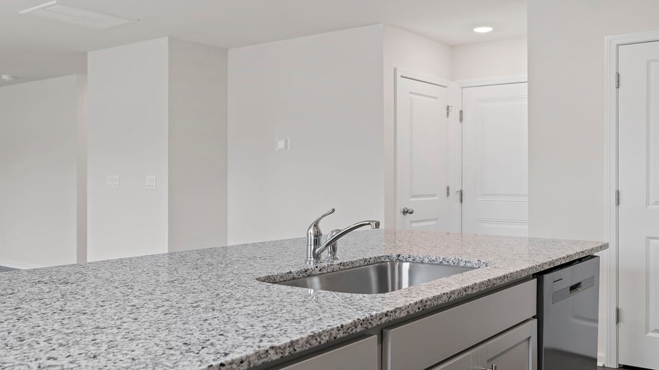 Kitchen island with quartz countertops.