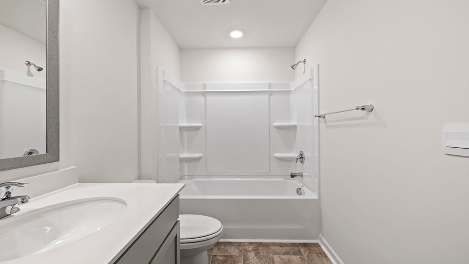 Hall bathroom with shower / tub.