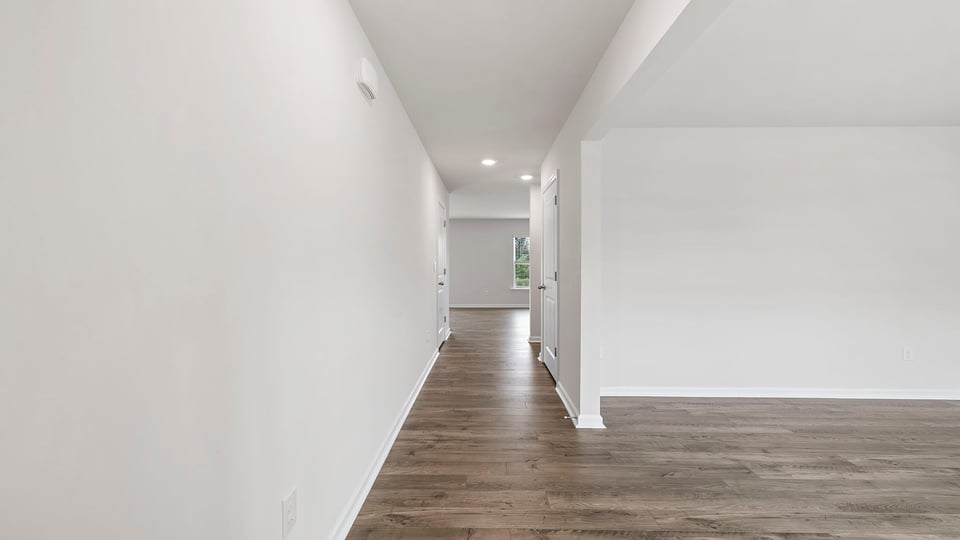 Entrance and view of flex room.