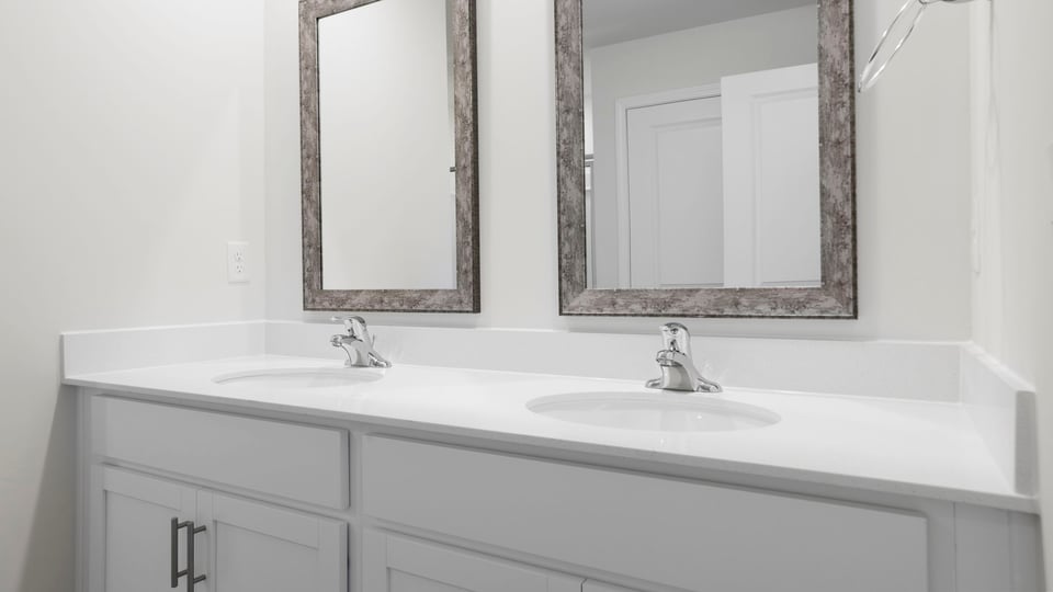 Bathroom with double vanity sink.