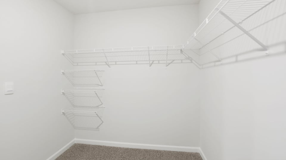 Closet with hanging storage racks.