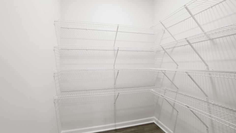 Closet with hanging storage racks.