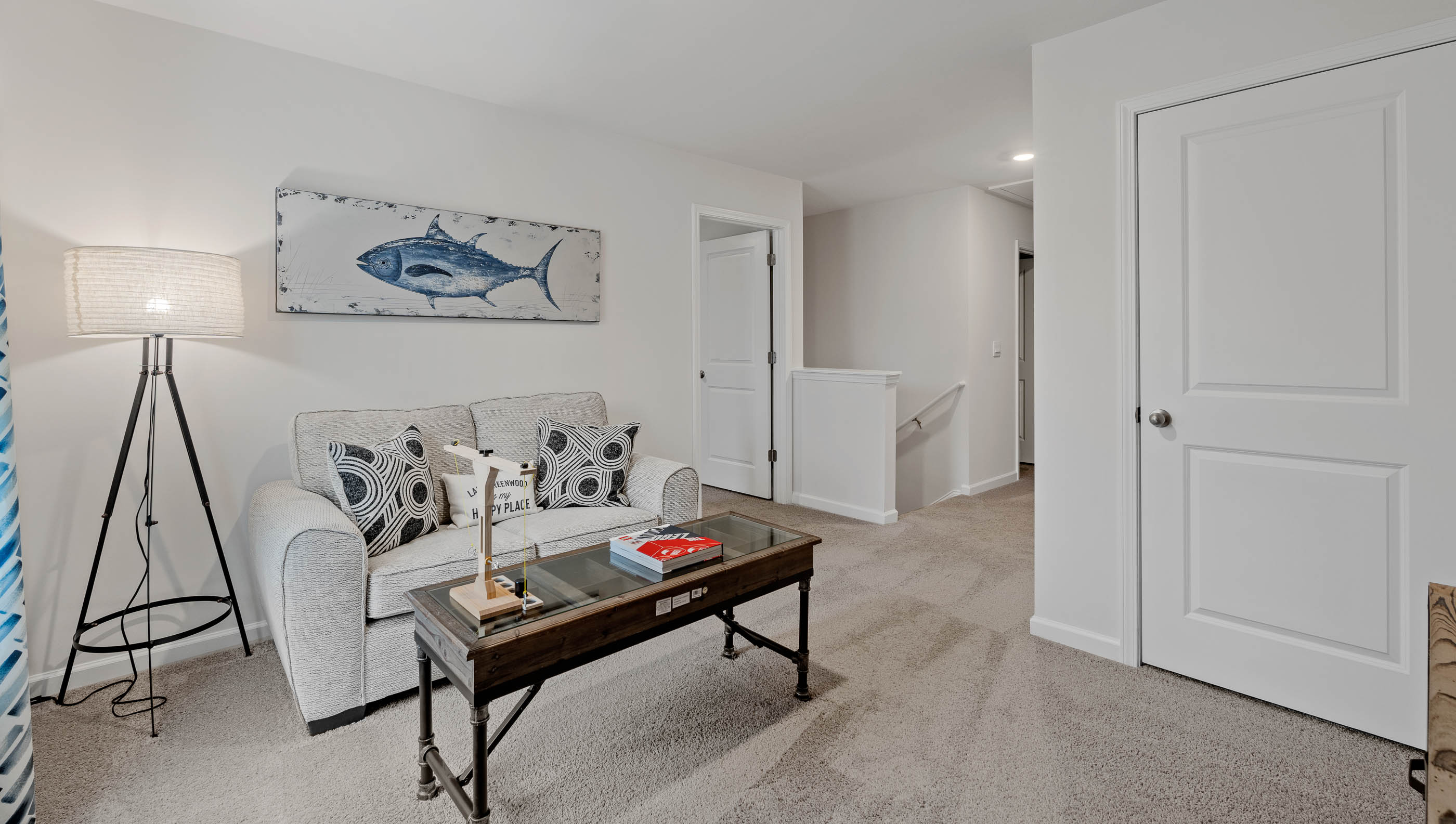 Loft with carpet and window.