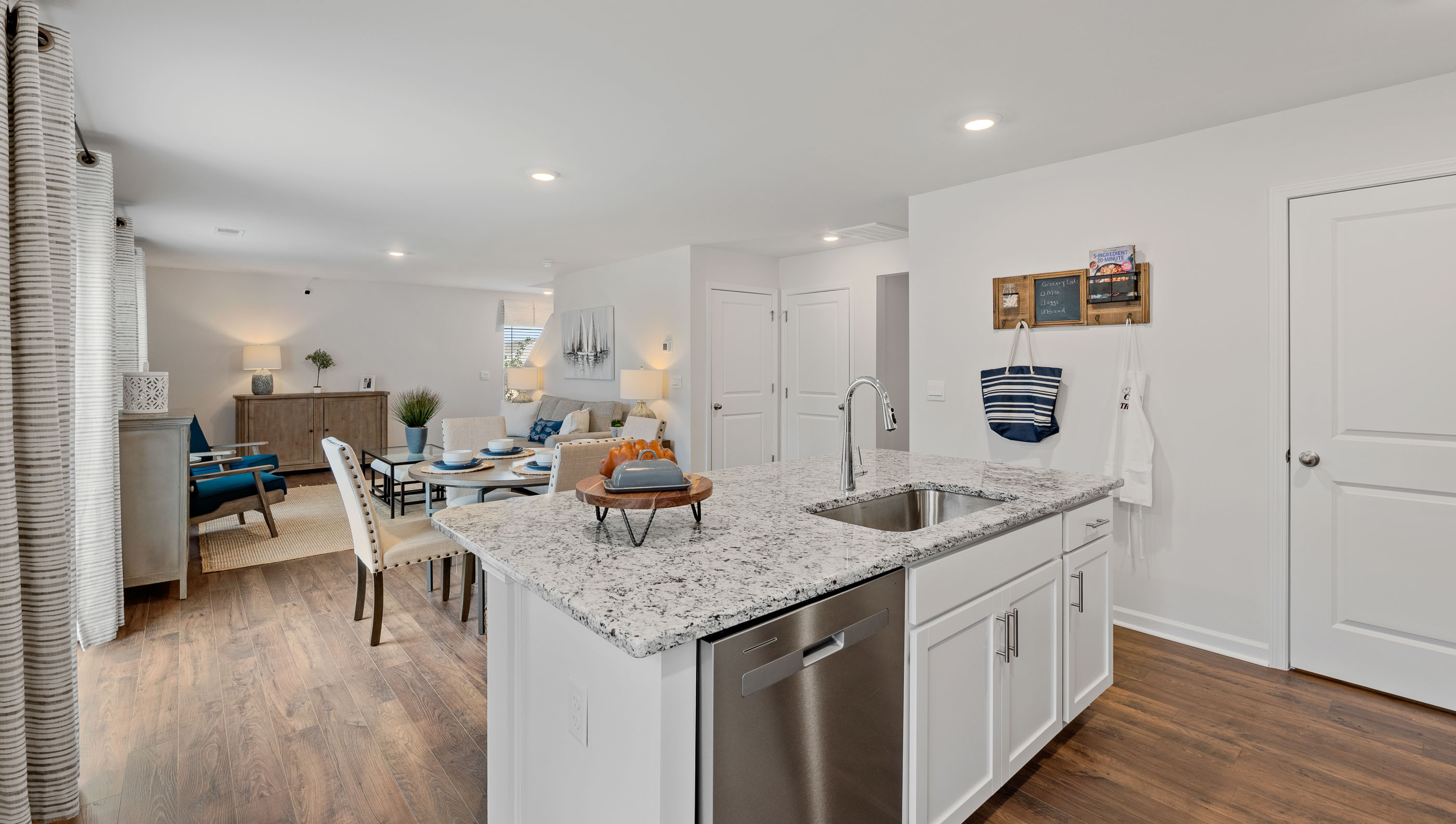 Kitchen with island and cabinets.