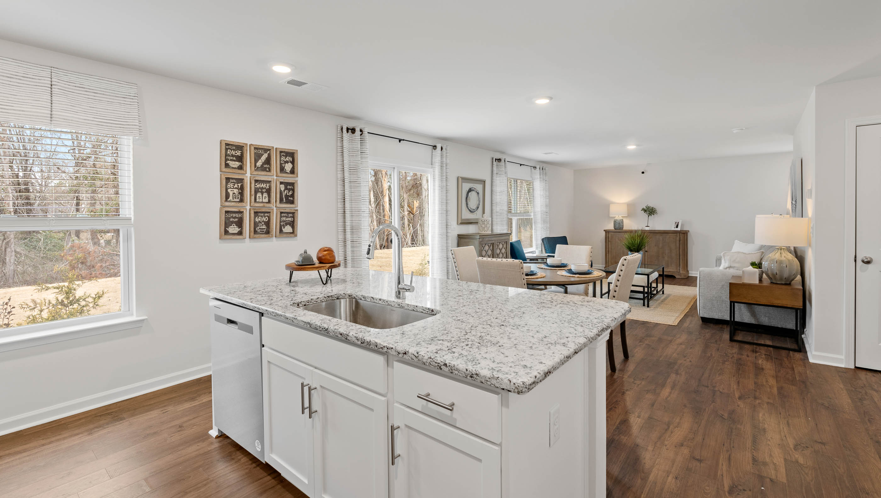 Kitchen with island and cabinets.