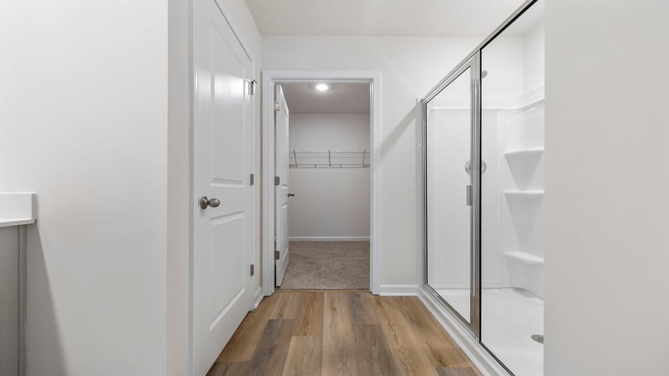 Primary bathroom with double vanity sink.