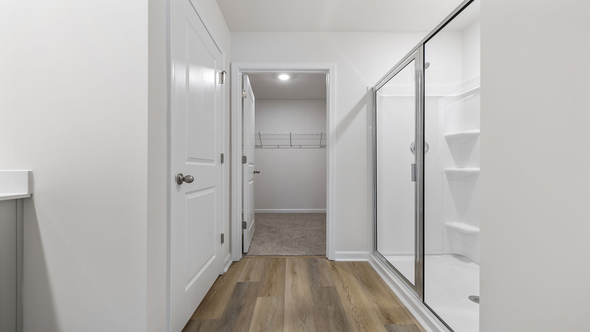Primary bathroom with walk-in shower.
