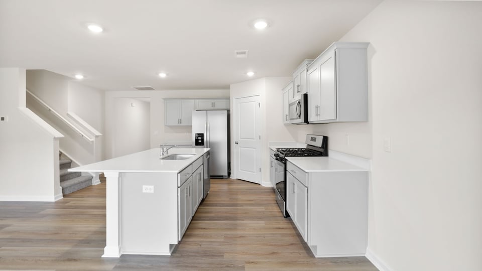 Kitchen with stainless steel appliances.