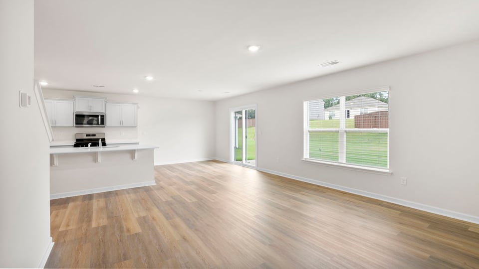 Family room with view of kitchen.