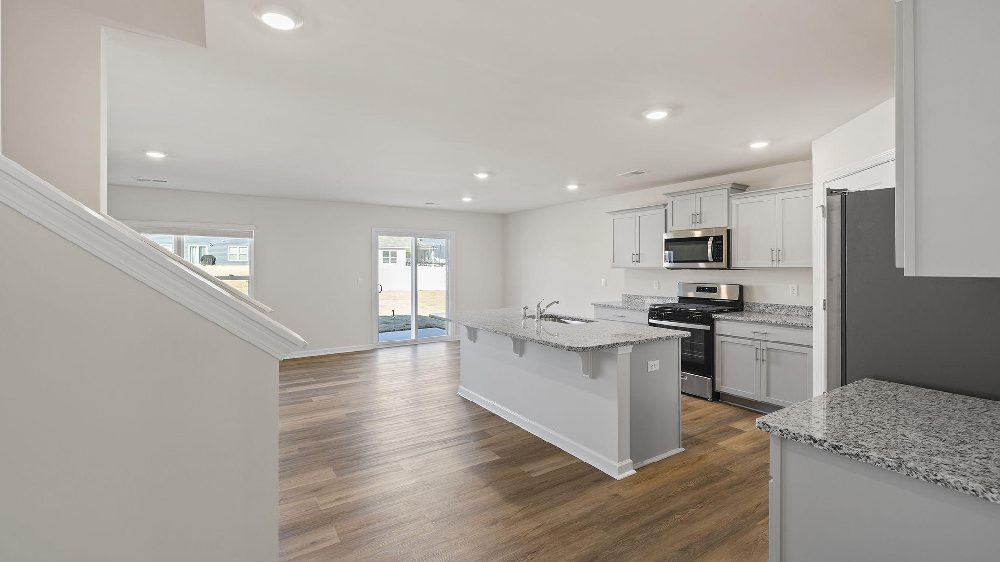 View of kitchen and dining area.
