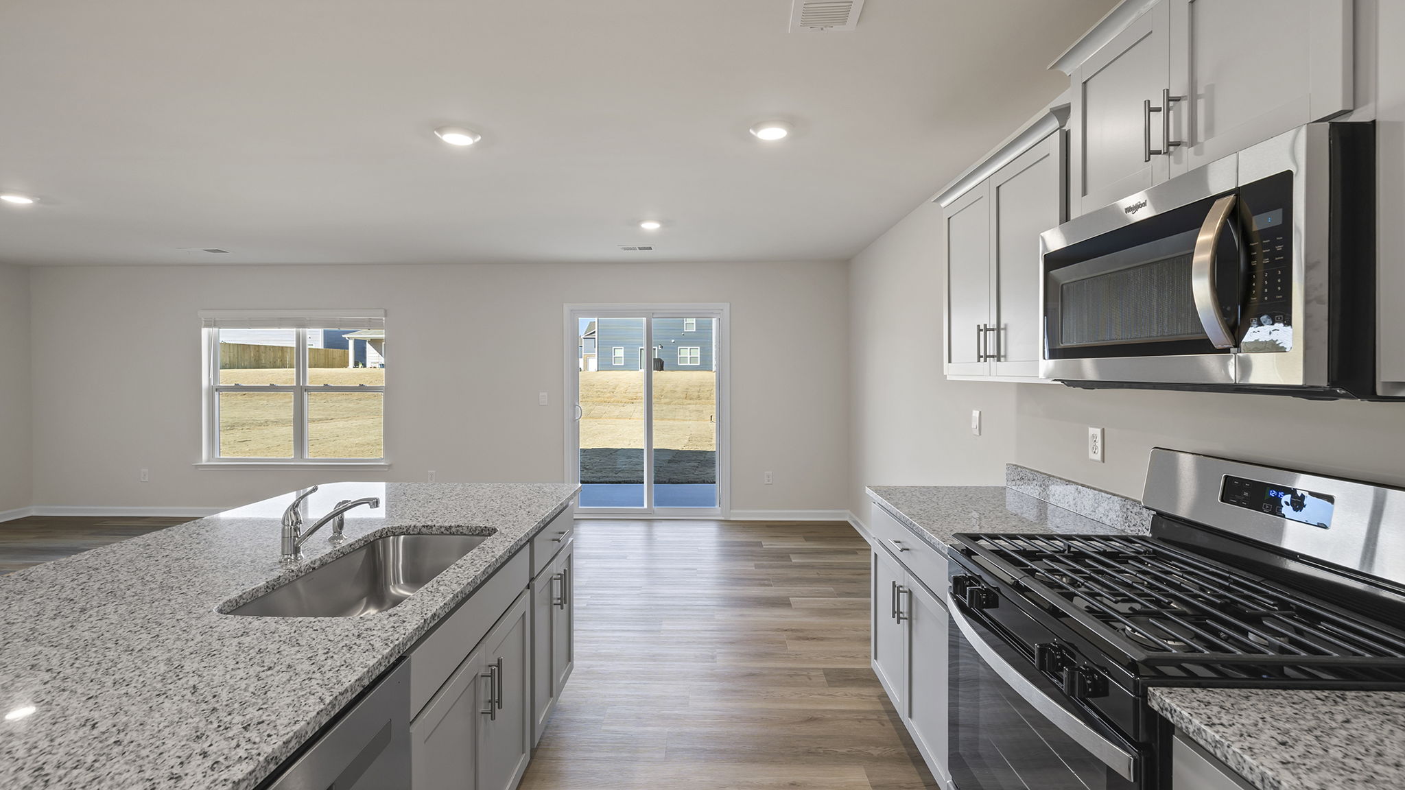 View of kitchen and door to the back yard.