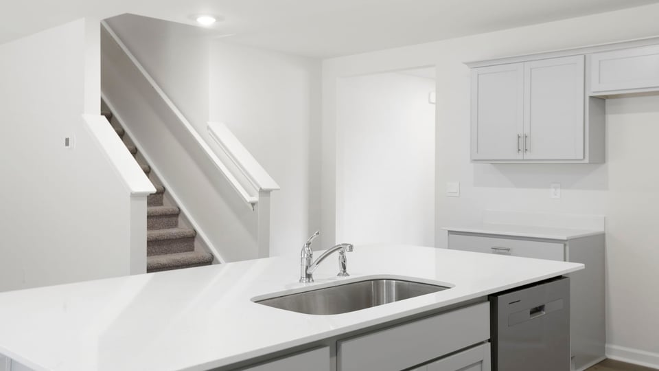 Kitchen with stainless steel appliances.
