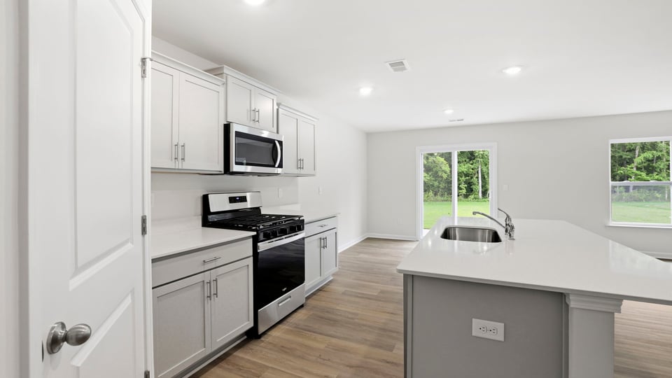 Kitchen with stainless steel appliances.