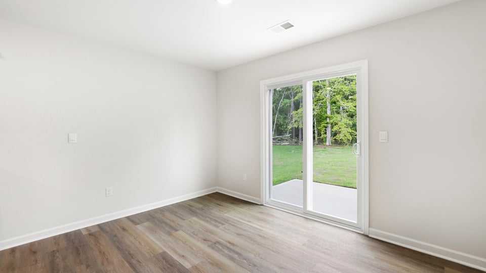 Family room with windows.