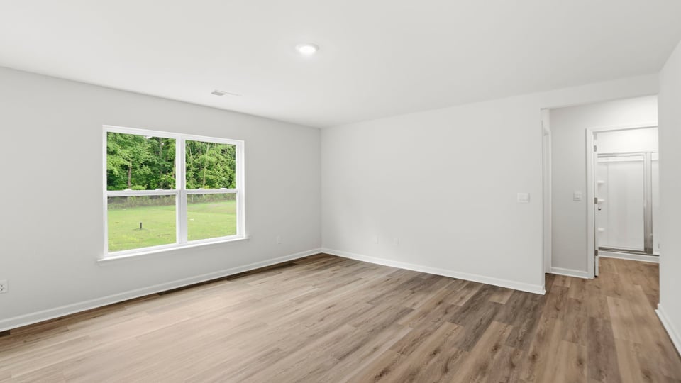 Family room with windows.