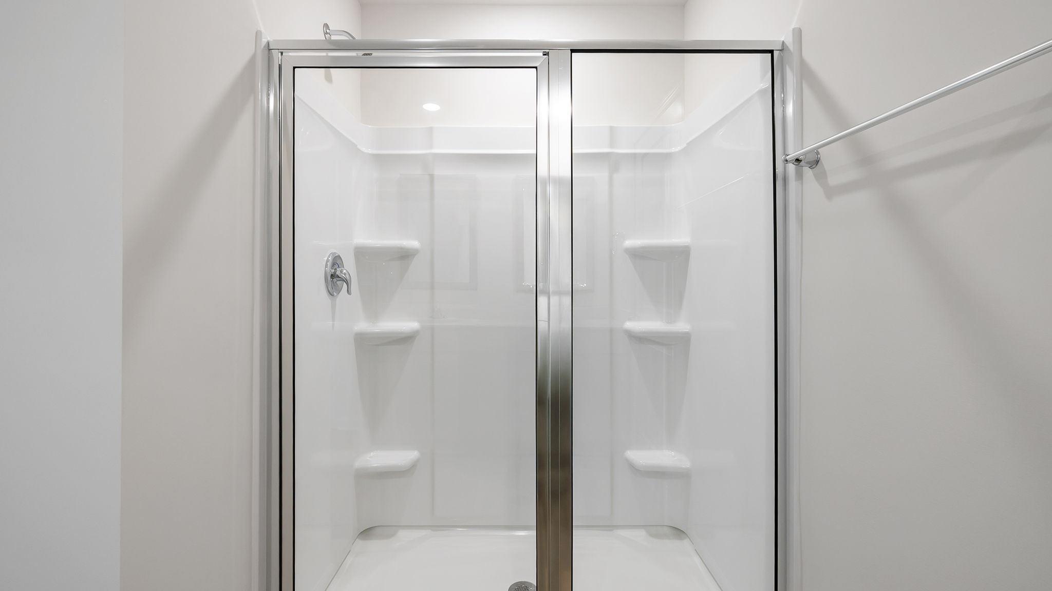 Primary bathroom walk-in shower.