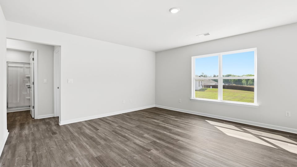 Family room with windows and fireplace.