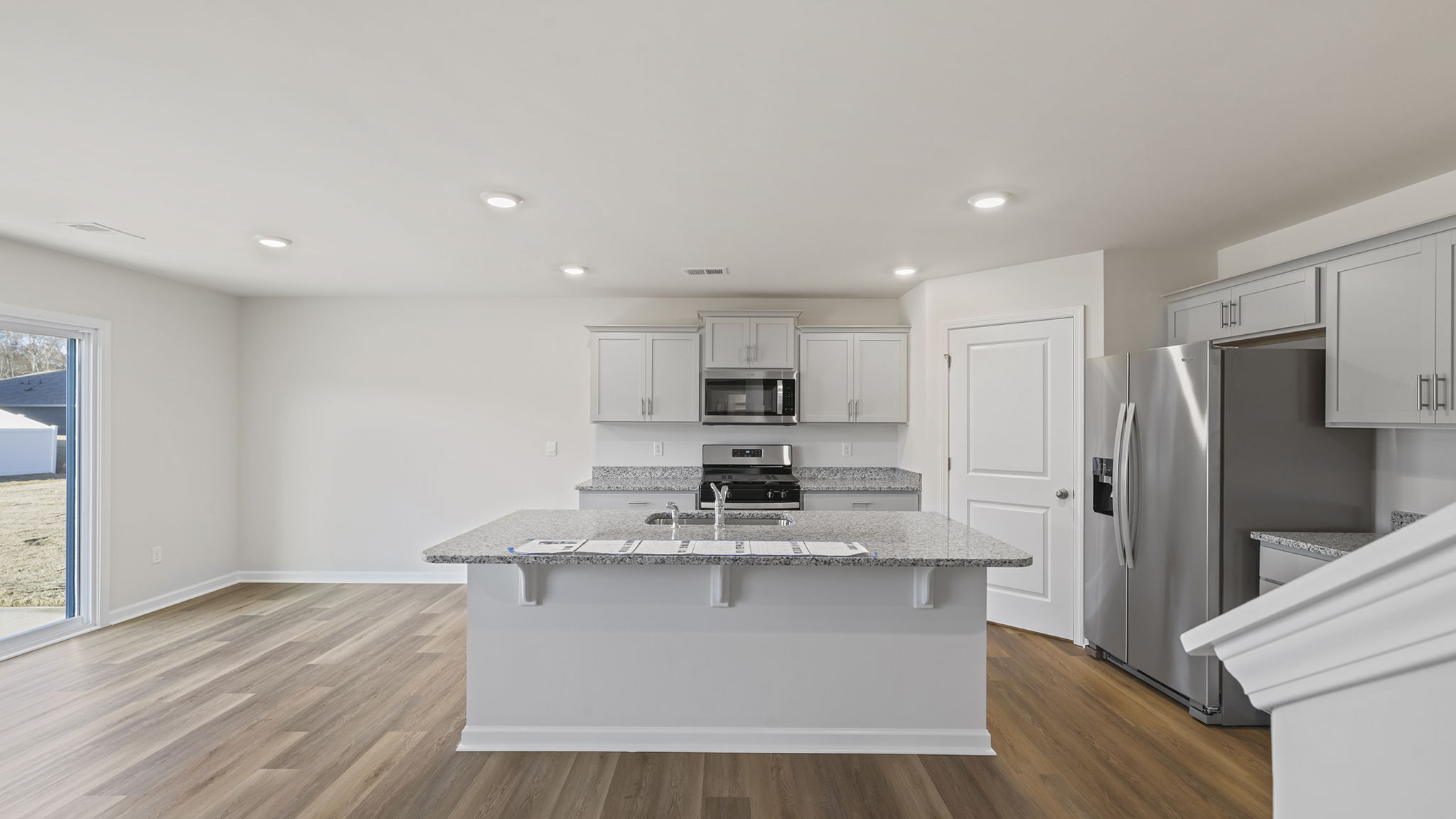 Kitchen island with granite countertops.