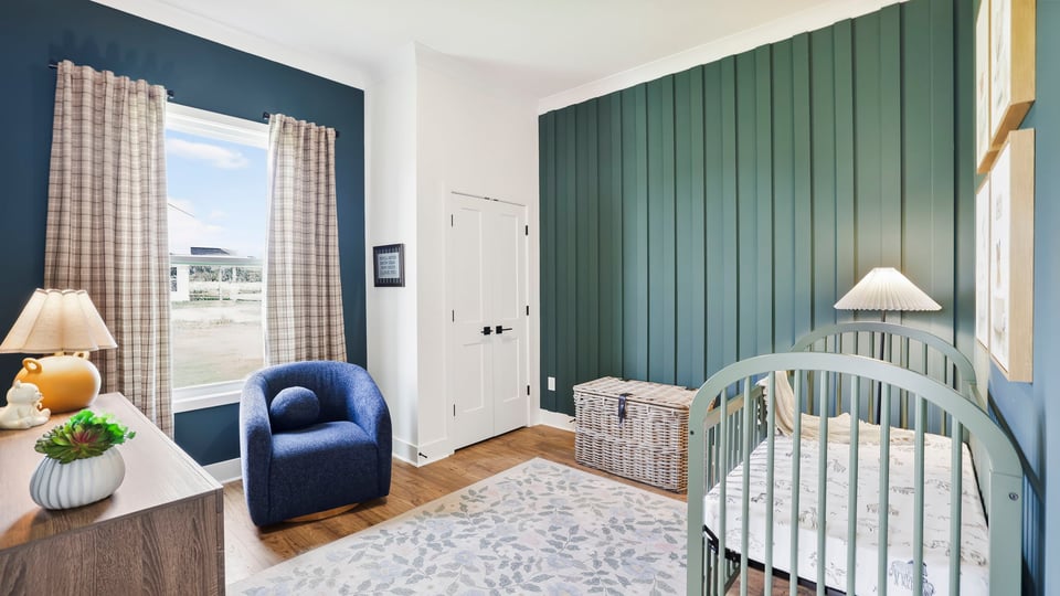 Bedroom with large window.