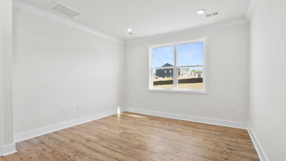 Bedroom with windows.