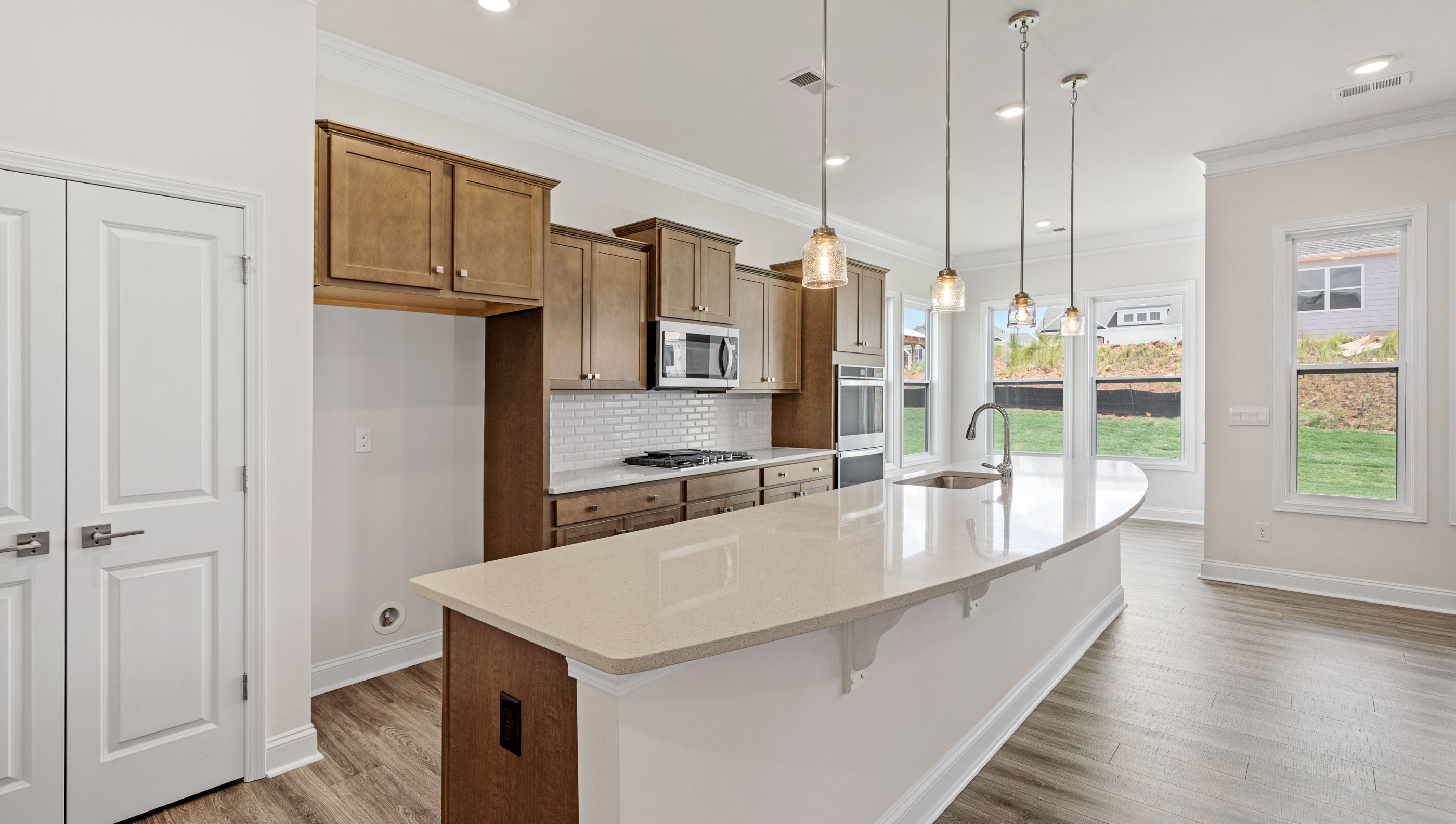 Kitchen with island and cabinates.