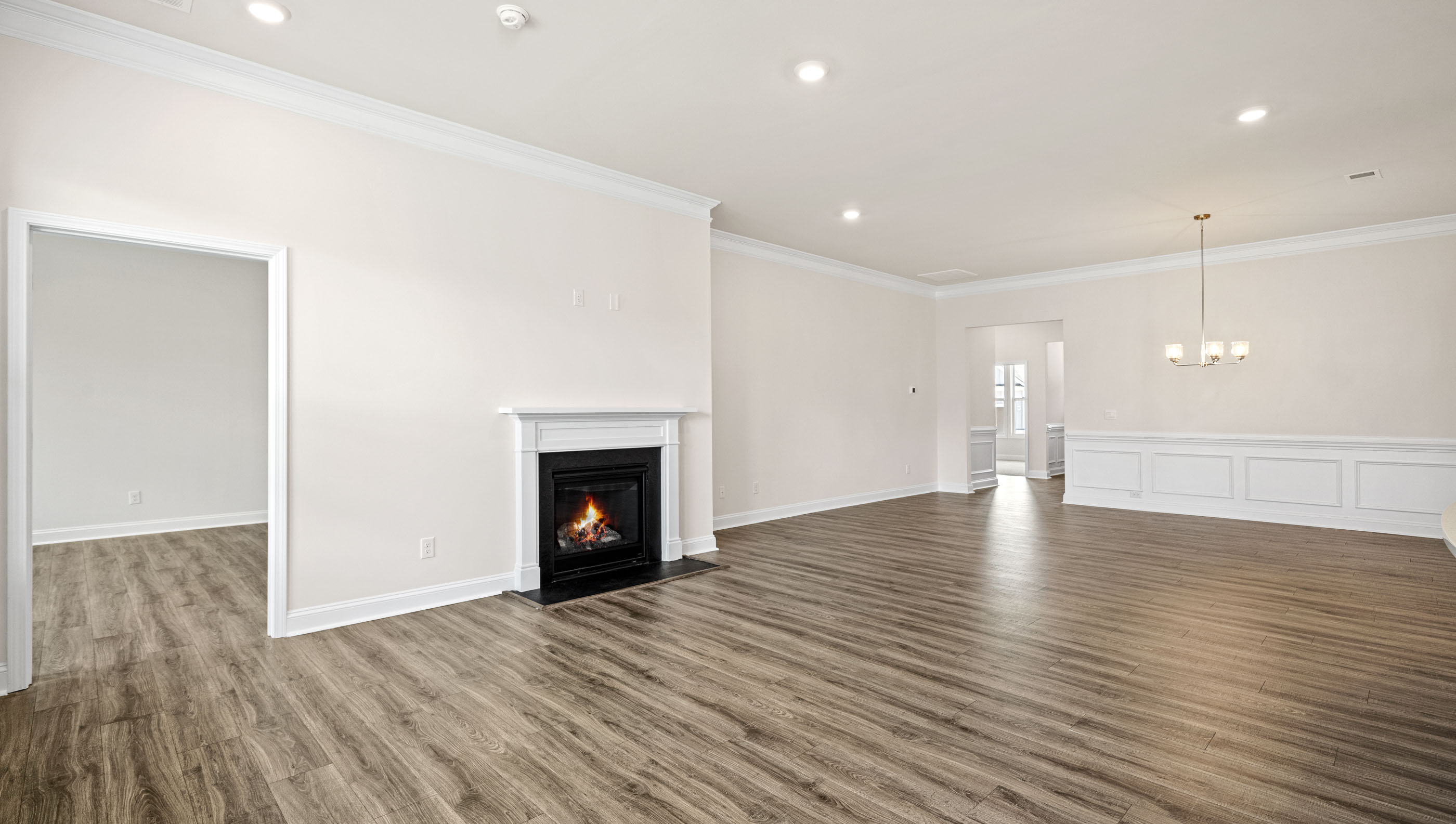 Livingroom with windows and firplace.