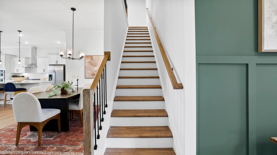 Stairs to bonus area and bedroom.