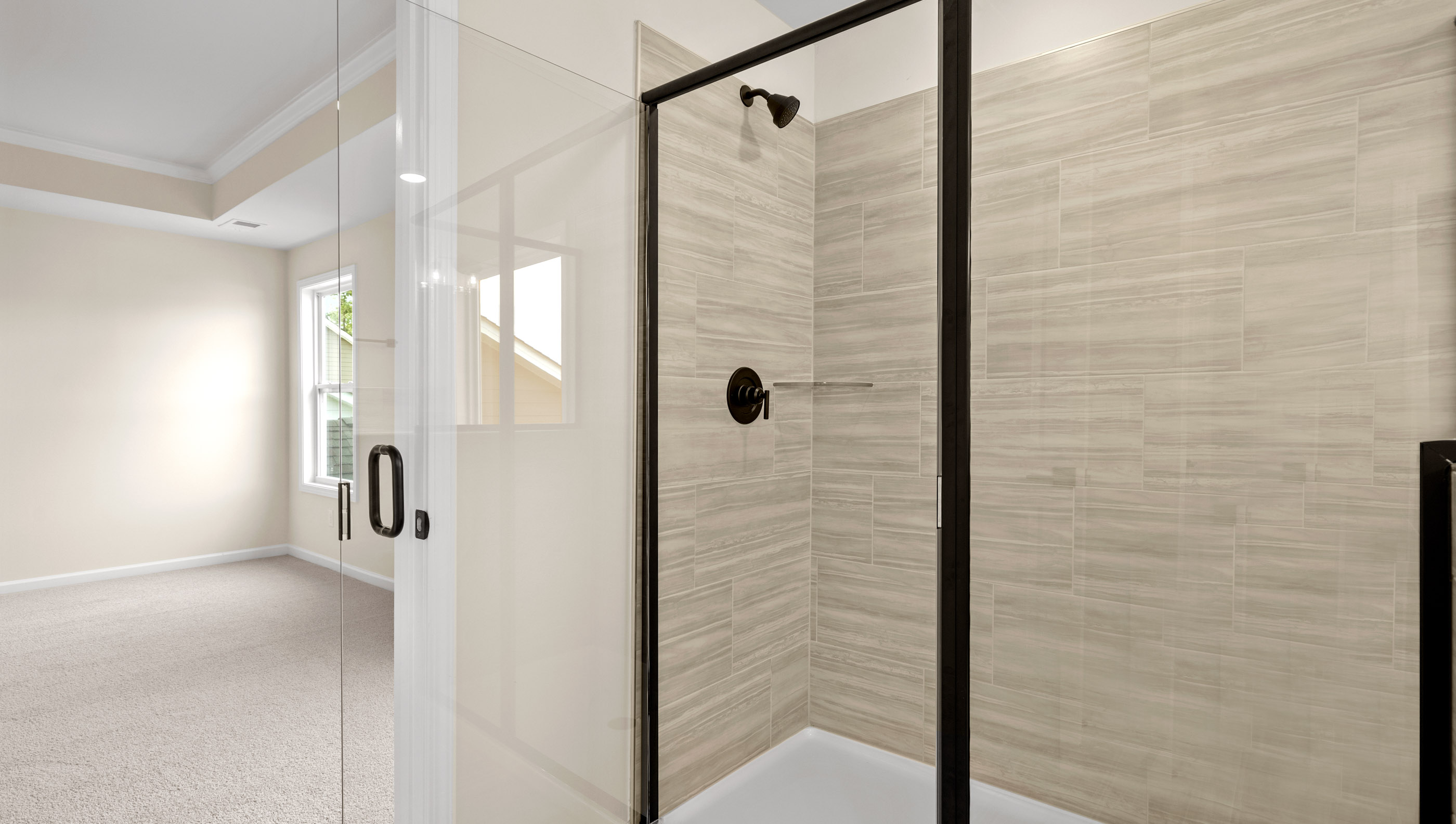 Bathroom with walk in shower.