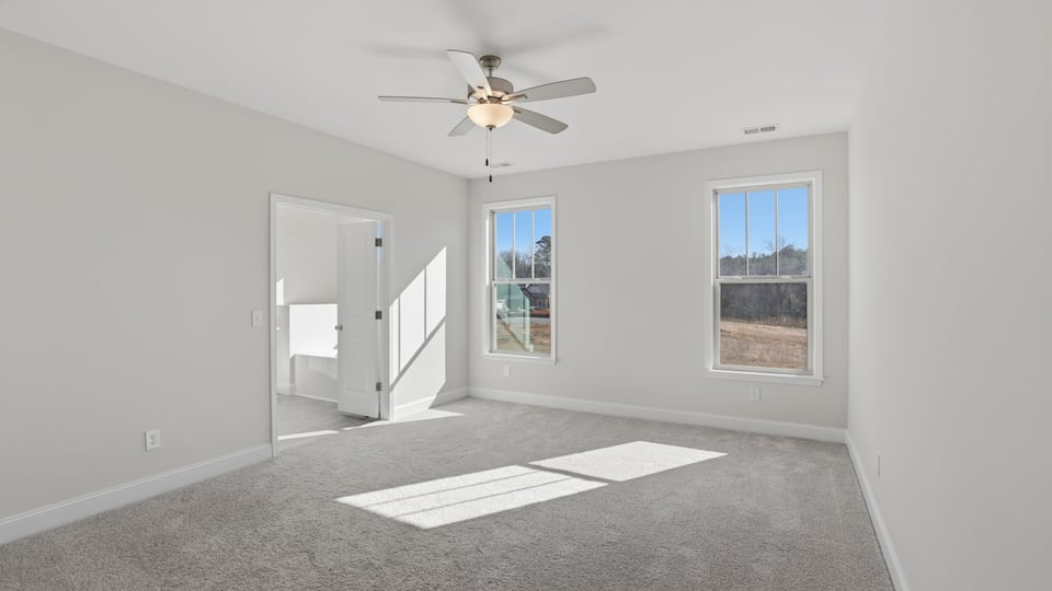 Bedroom with windows.