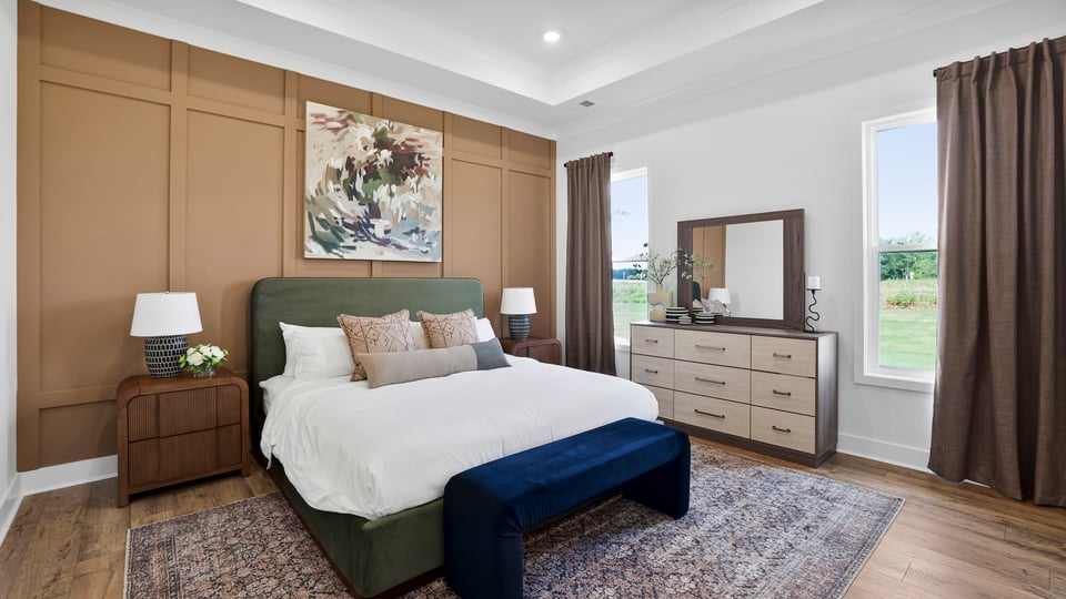 Bedroom with large windows.