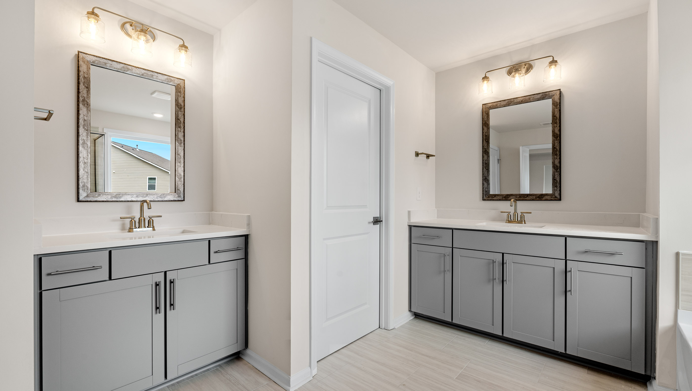Bathroom with his and hers vanity.
