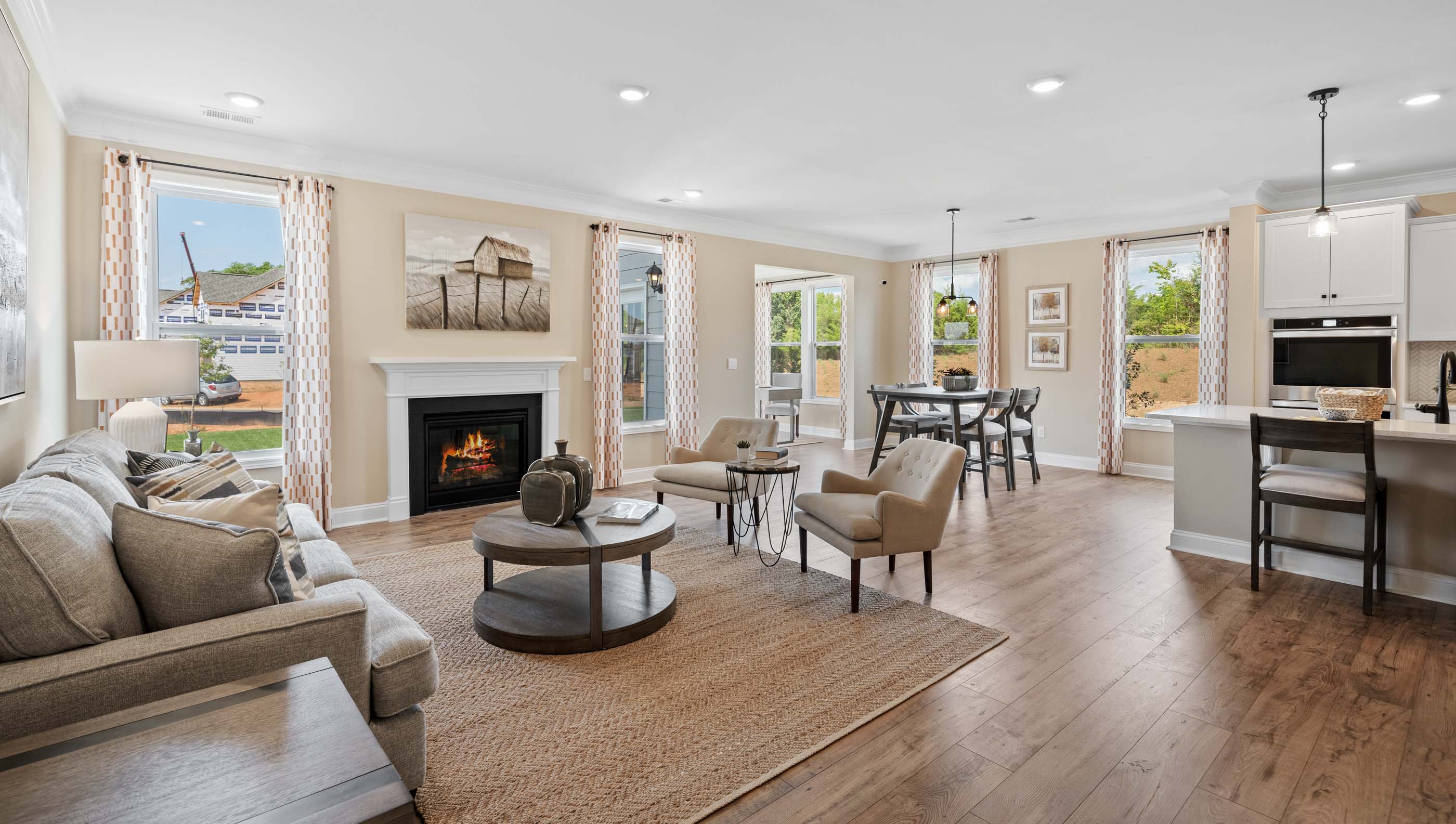 Livingroom with windows and fireplace.