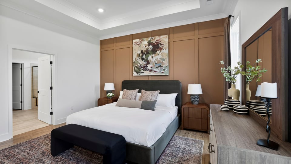 Bedroom with large windows.
