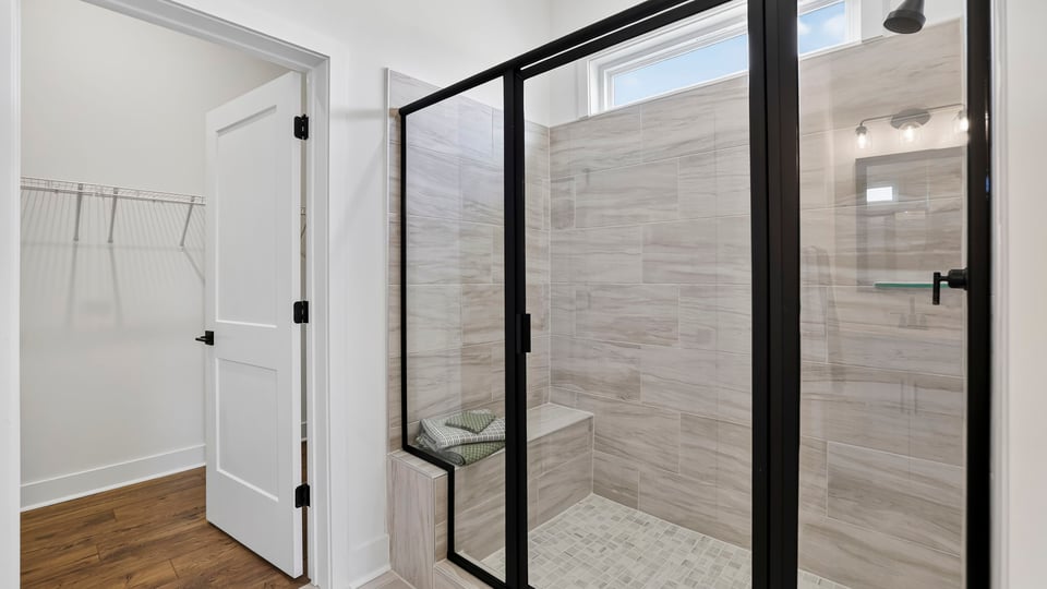 Bathroom with walk in shower.