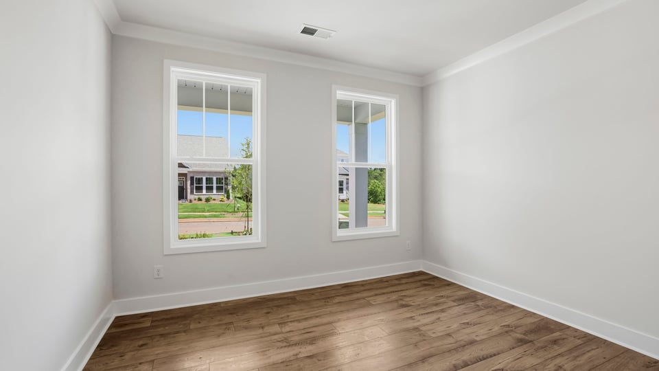 Flex space with 2 small windows.