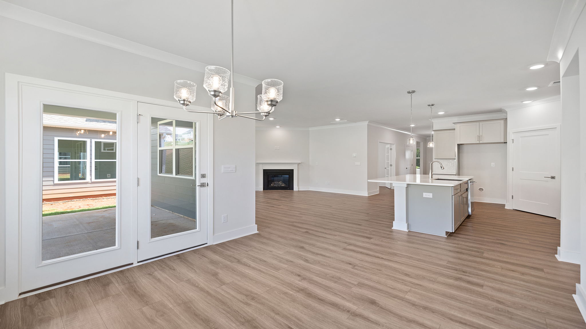 View from dining area toward kitchen and family room.