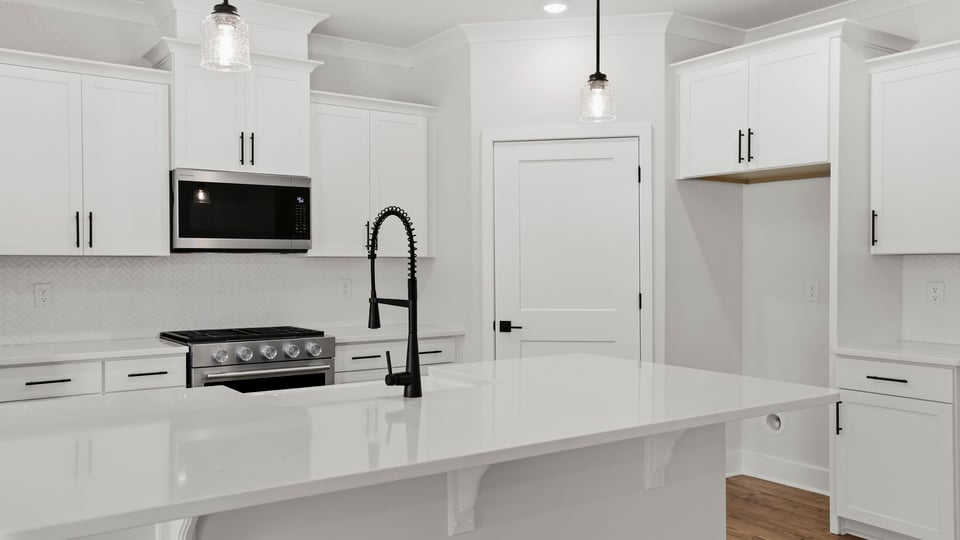 Kitchen with stainless steel appliances.