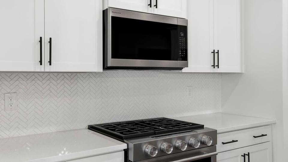 Kitchen with stainless steel appliances.