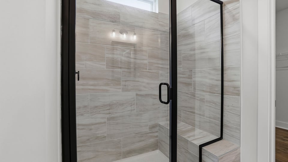 Bathroom with walk in shower.
