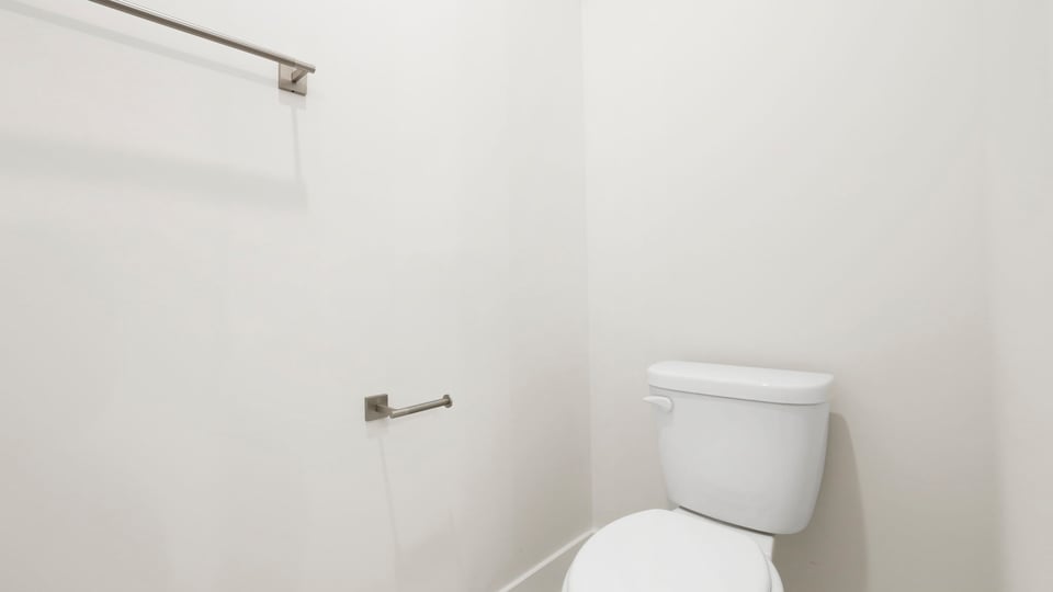 Primary bathroom with double vanity sinks.