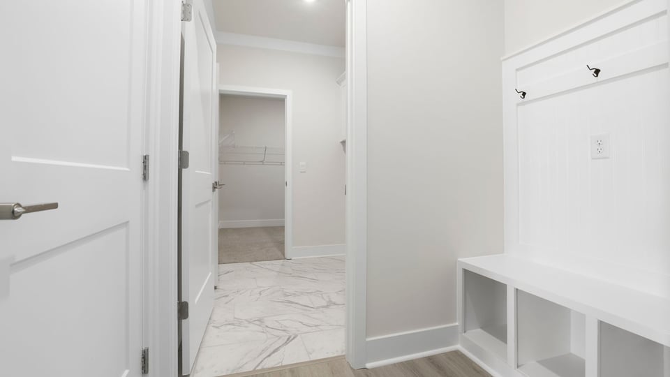 Hallway with storage.