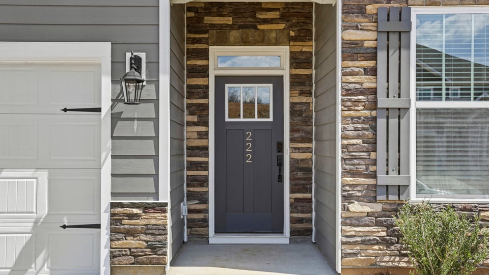 Inviting entry with stone accents.