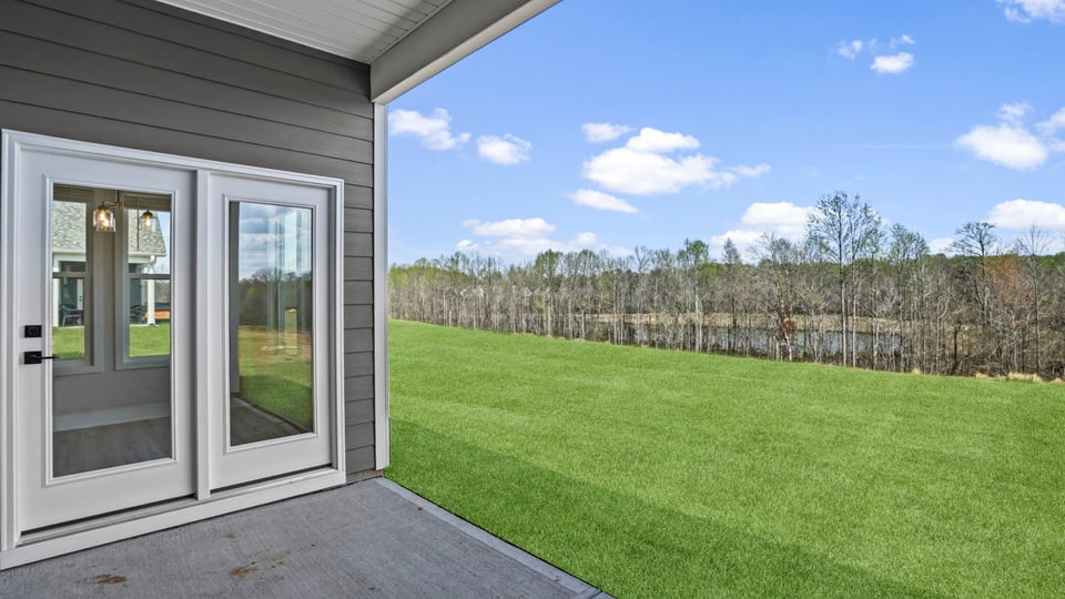 Back exterior of the Azalea with covered porch.