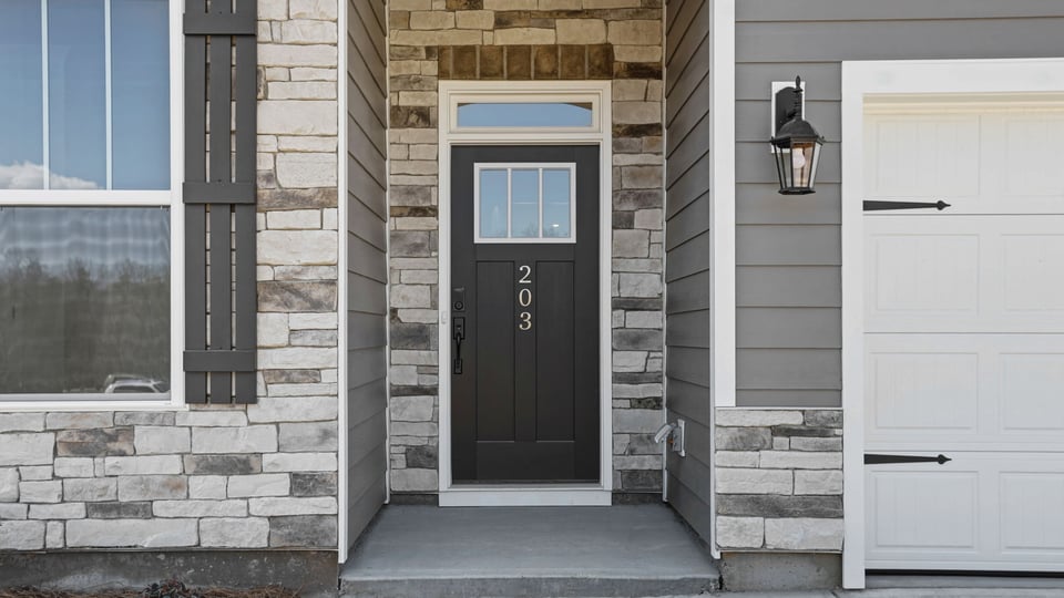 Inviting entry accented with stone.