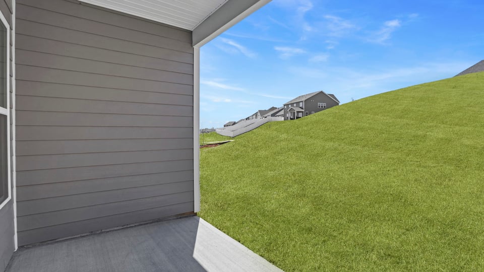 Back exterior of the Azalea with covered porch.