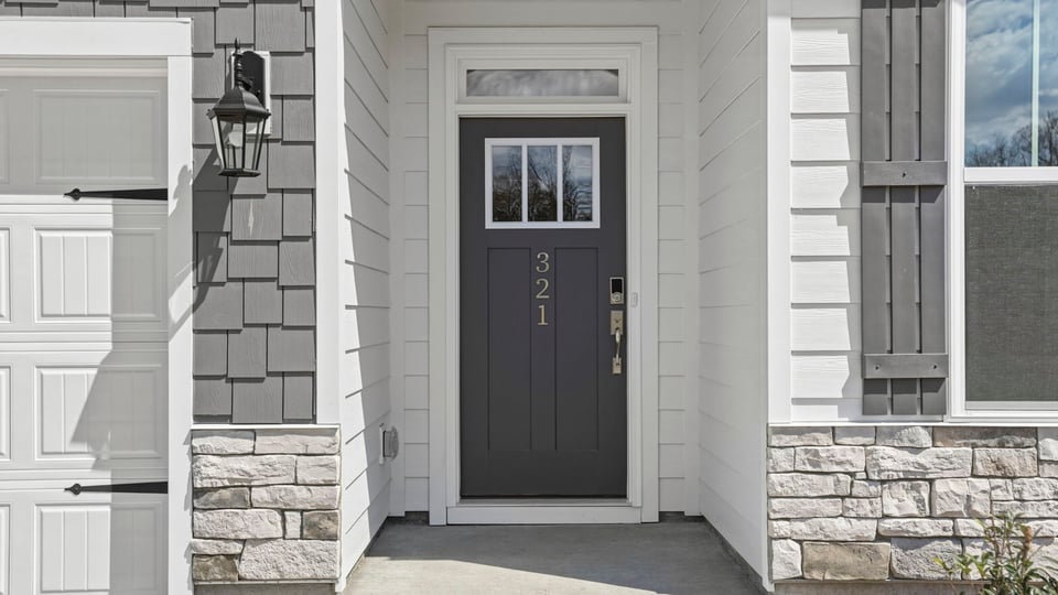 Inviting entry with stone accents.