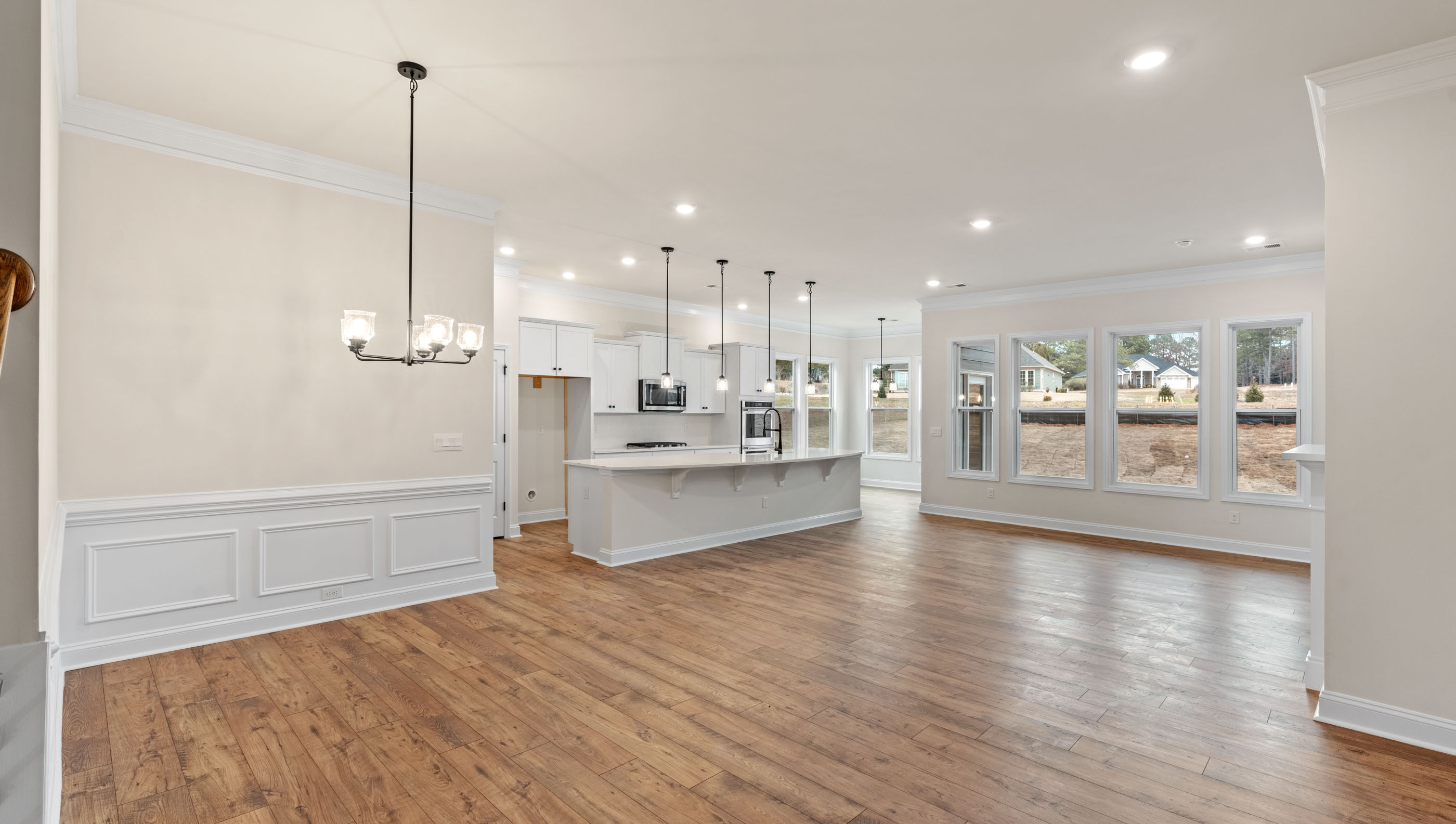 Family room with view of kitchen.