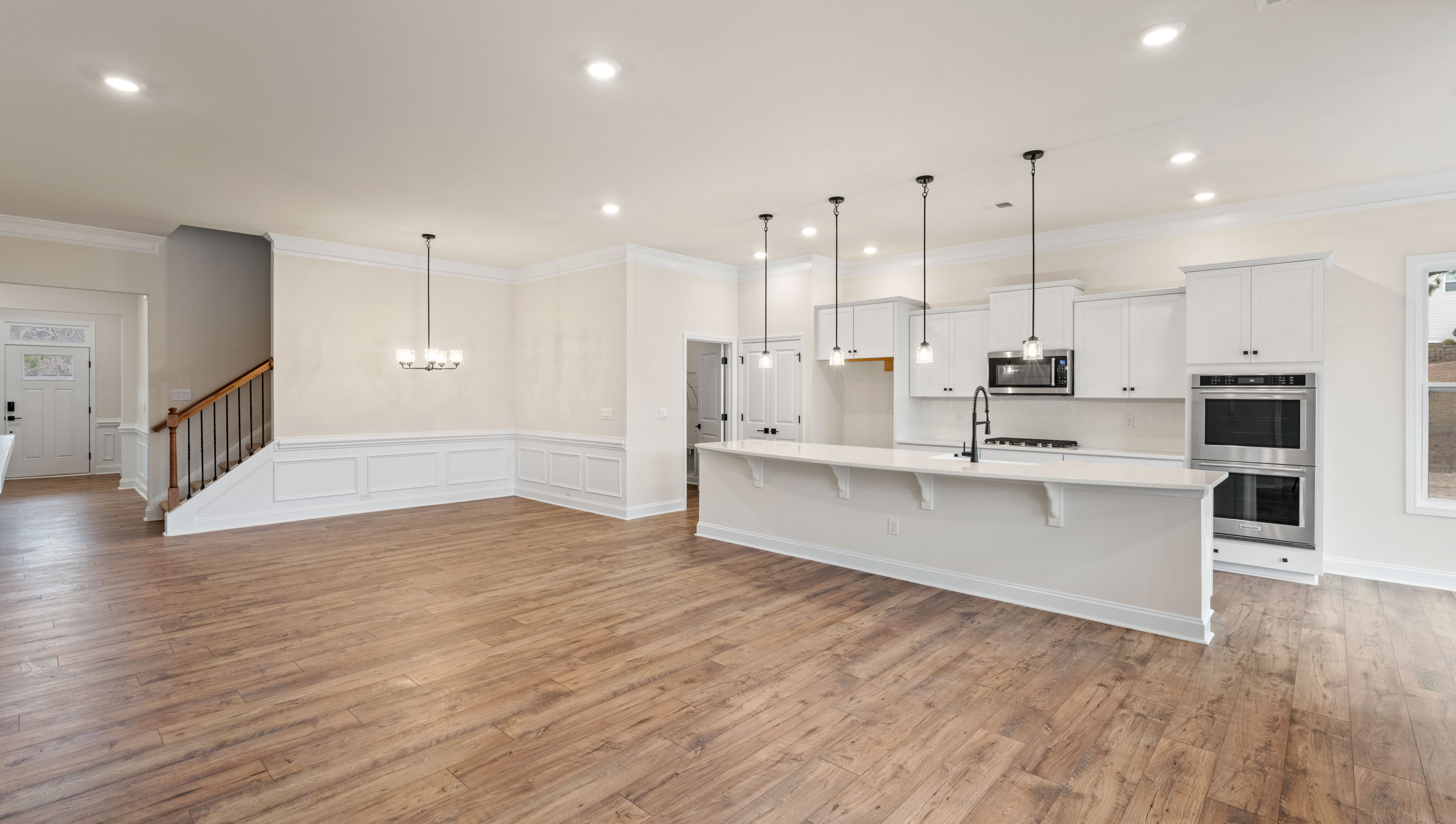 Family room with view of kitchen.