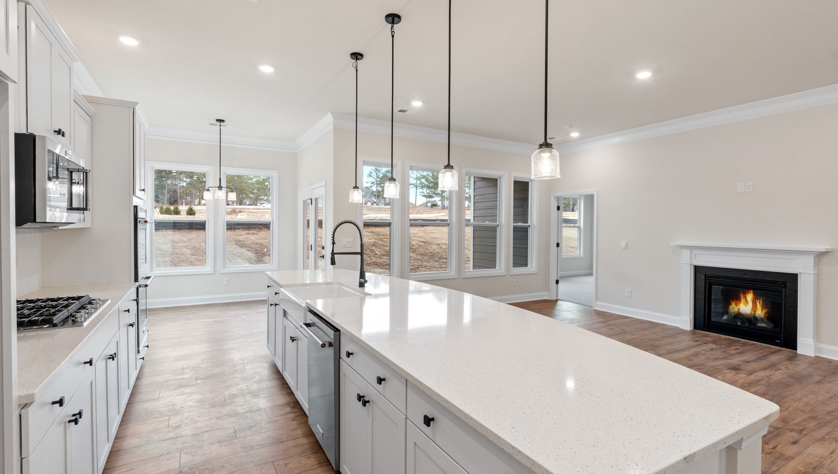 Kitchen with view of family room.